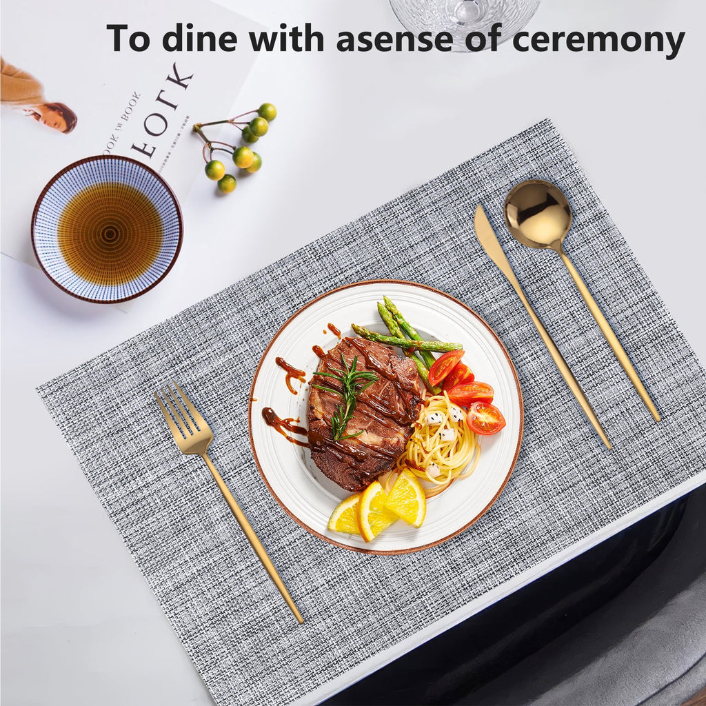 VCVCOO Navy Blue Placemats Set of 4 - Easy Clean Washable PVC Vinyl Placemats - Wipeable Heat Resistant Woven Table Mats for Dining Table - 12x18 inch