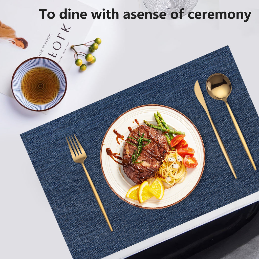 VCVCOO Navy Blue Placemats Set of 4 - Easy Clean Washable PVC Vinyl Placemats - Wipeable Heat Resistant Woven Table Mats for Dining Table - 12x18 inch